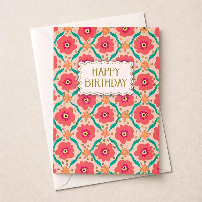 Floral birthday card with pink blooms and gold accents, perfect for sending warm greetings and spreading joy.