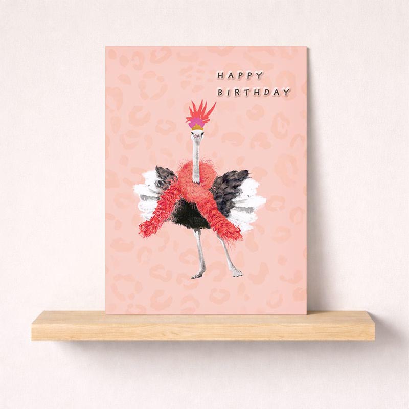 Pink ostrich in hat and scarf greetings card, perfect for birthdays or thank yous. Cute and quirky design to bring a smile.