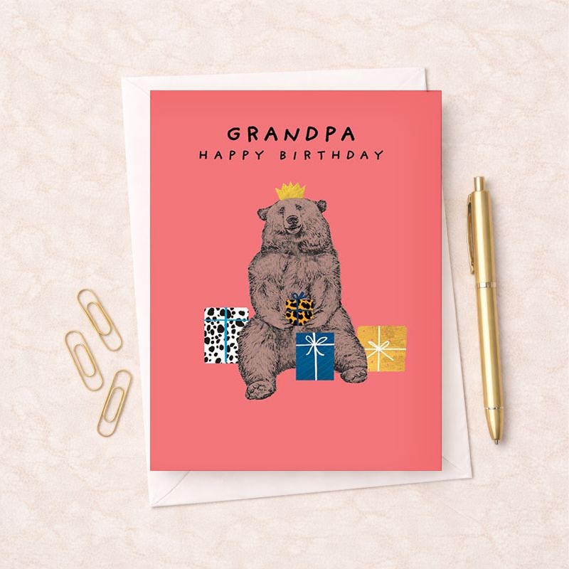 Charming bear card with crown, gift box, and pastel background. Perfect for spreading joy and celebrating special occasions.