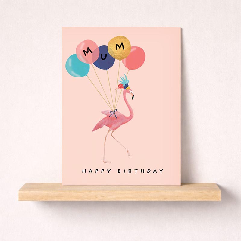 Cheerful flamingo greetings card with colourful balloons and "mum" text. Perfect for showing love and appreciation to your mum on any occasion.