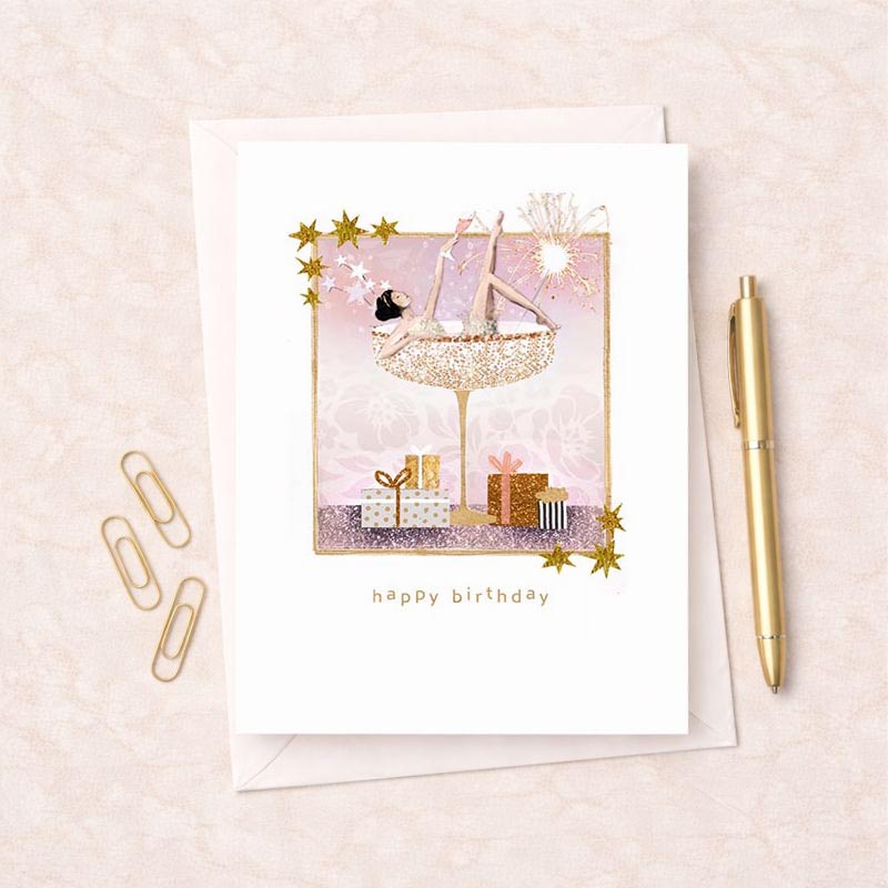 Cute and quirky birthday card with woman on cake, pink background, gold frame, and presents. Ideal for fun-loving friends and family.