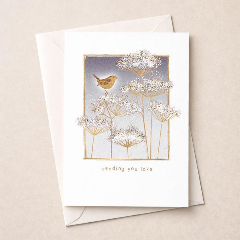Charming greetings card with bird on flower, perfect for spreading joy to loved ones.