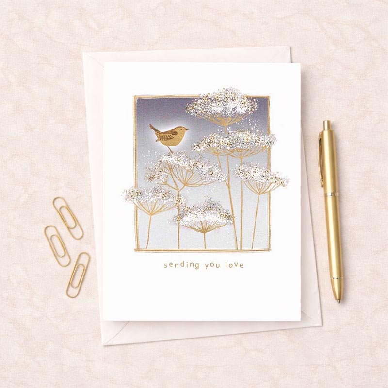 Charming greetings card with bird on flower, perfect for spreading joy to loved ones.