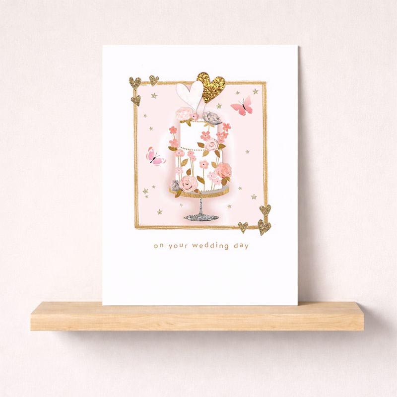 Sweet cake with butterflies &amp; flowers on pink background, perfect for birthdays, weddings, or heartfelt messages.