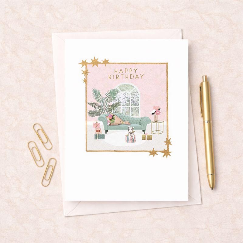 Charming birthday card with cute dog on couch, pastel colours and floral accents. Perfect for dog lovers and spreading joy.