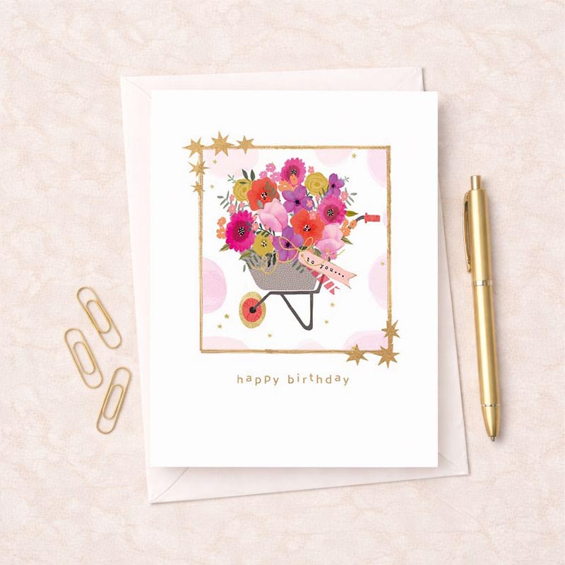 Bright and cheerful greetings card with overflowing wheelbarrow of flowers and "you are loved" message. Ideal for birthdays, anniversaries, or to show you care.