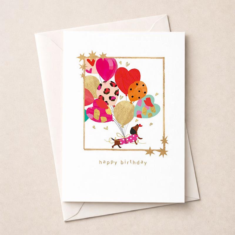 Cheerful dog with balloons card, perfect for birthdays or to brighten someone's day. Ideal for dog lovers or kids.