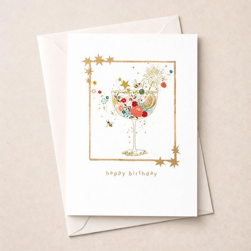 Cheerful birthday card with cocktail glass filled with vibrant fruits, perfect for friends or family who appreciate a fun greetings.