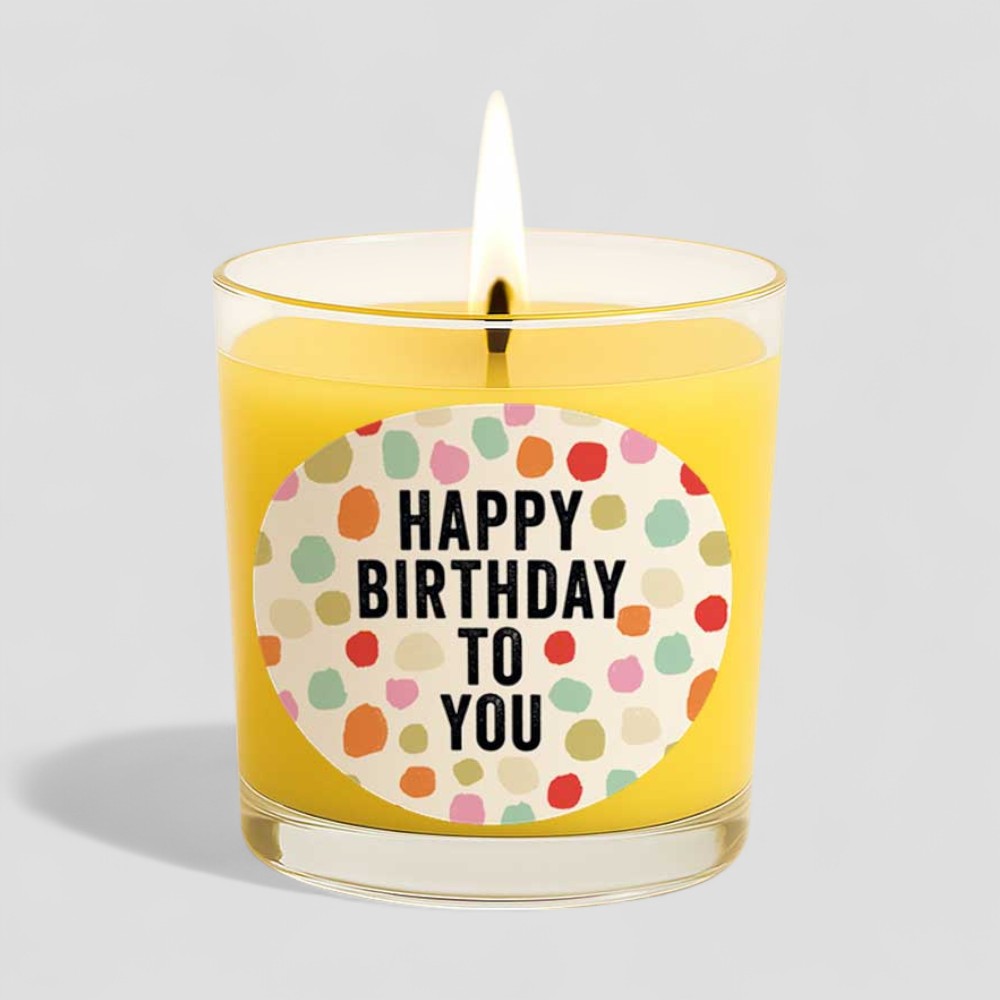 Vanilla scented birthday candle with colourful cat illustrations on the box and candle label