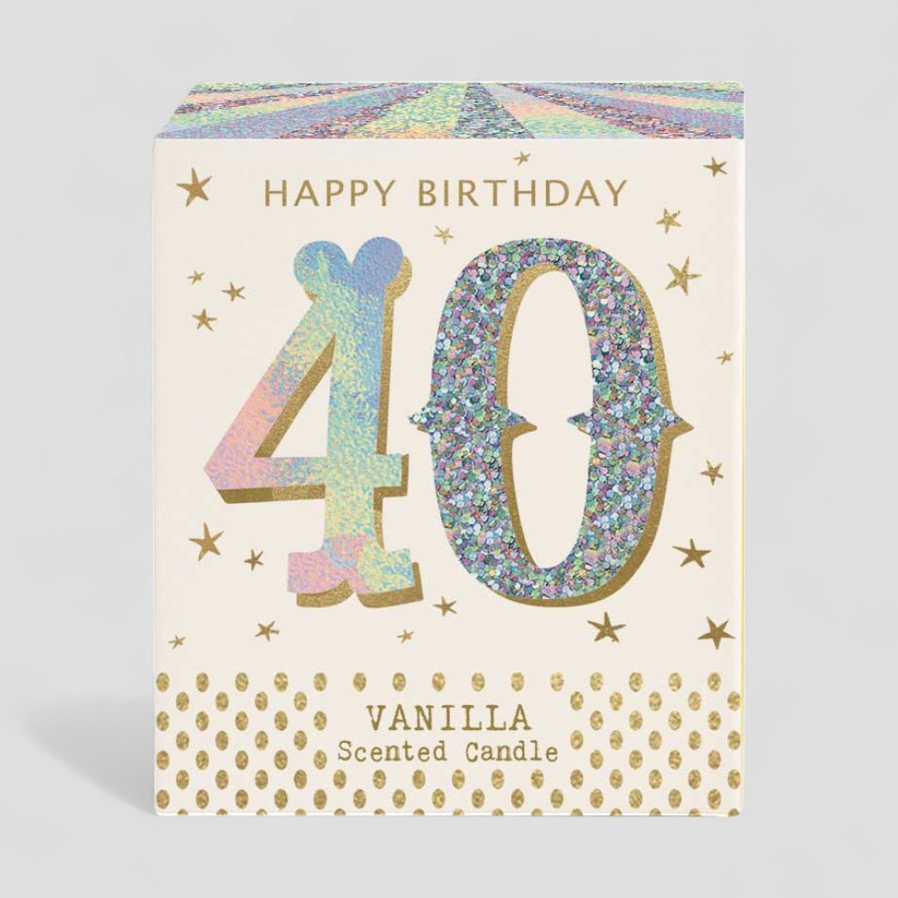 Vanilla scented birthday candle with glittery 40 design and box on a grey background
