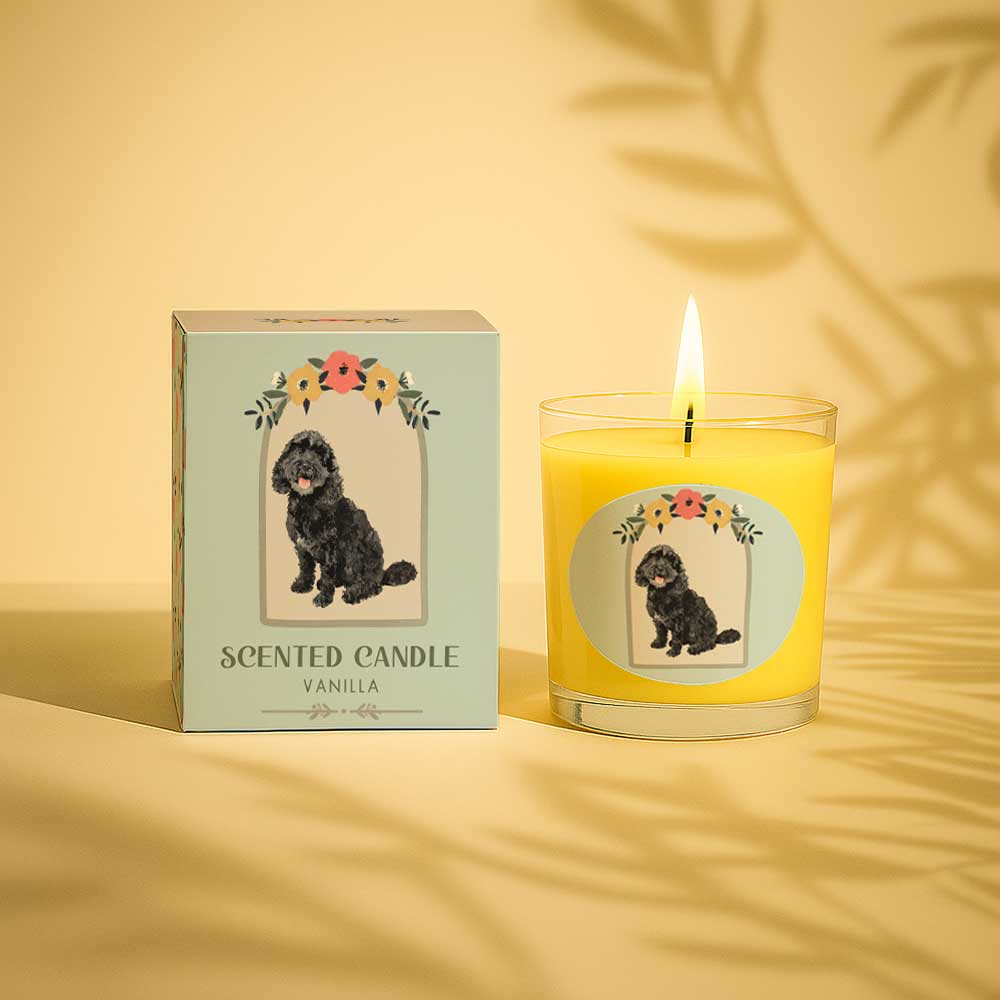 Vanilla scented candle with a black dog illustration on box and glass
