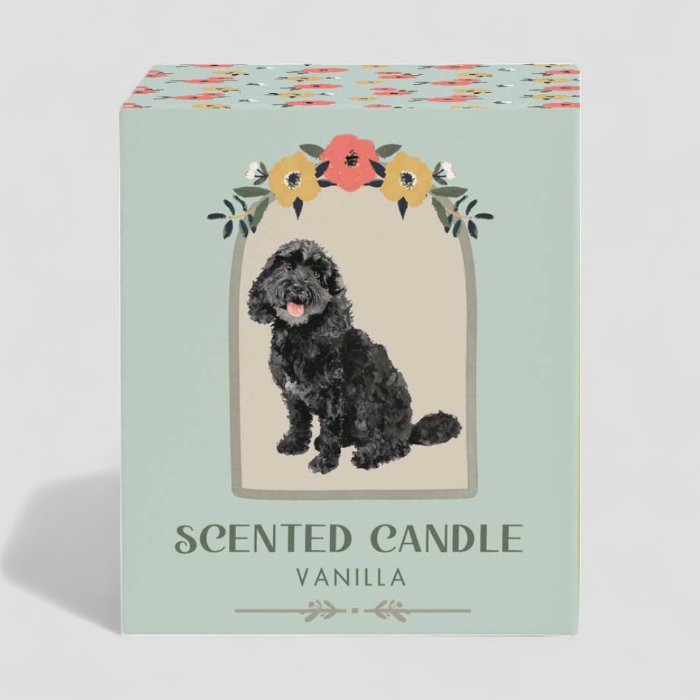 Vanilla scented candle with a black dog illustration on box and glass