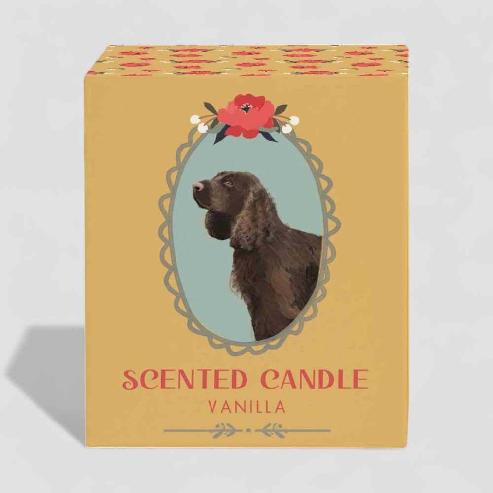 Vanilla scented candle with dog illustration on glass and matching box packaging.