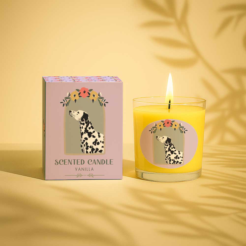 Lit vanilla scented candle with Dalmatian dog design and matching box