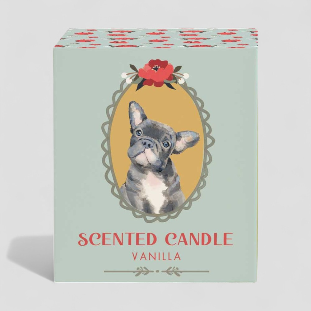 Vanilla scented candle in glass with dog illustration on label and matching box