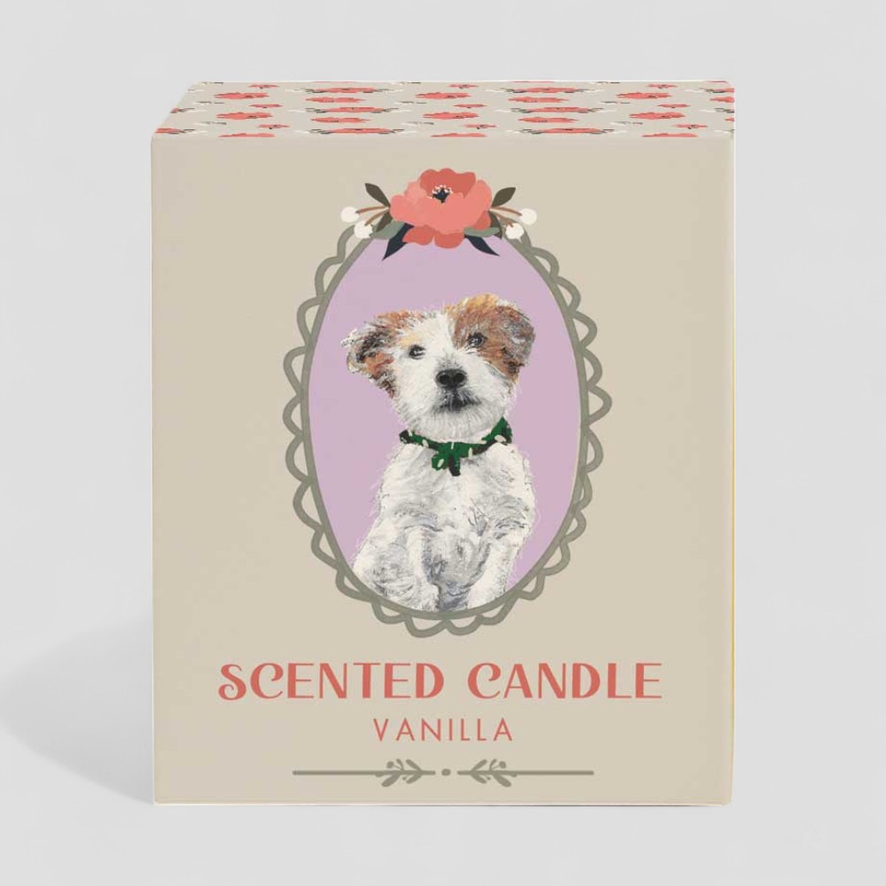 Vanilla scented candle with dog illustration on box and glass burning on white background