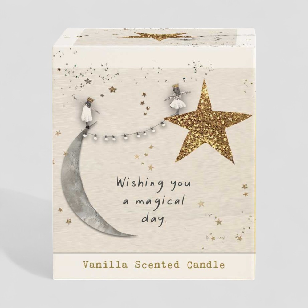 Lit vanilla scented candle with wishing you a magical day message and decorative box.