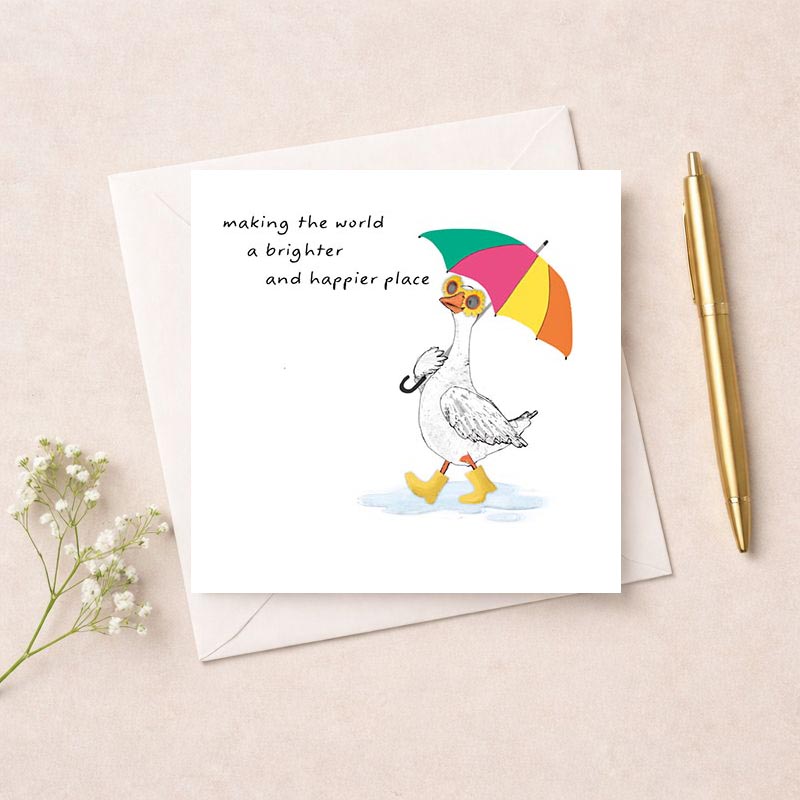 Duck with umbrella in rain on greetings card. Cheerful and whimsical design to brighten someone's day.