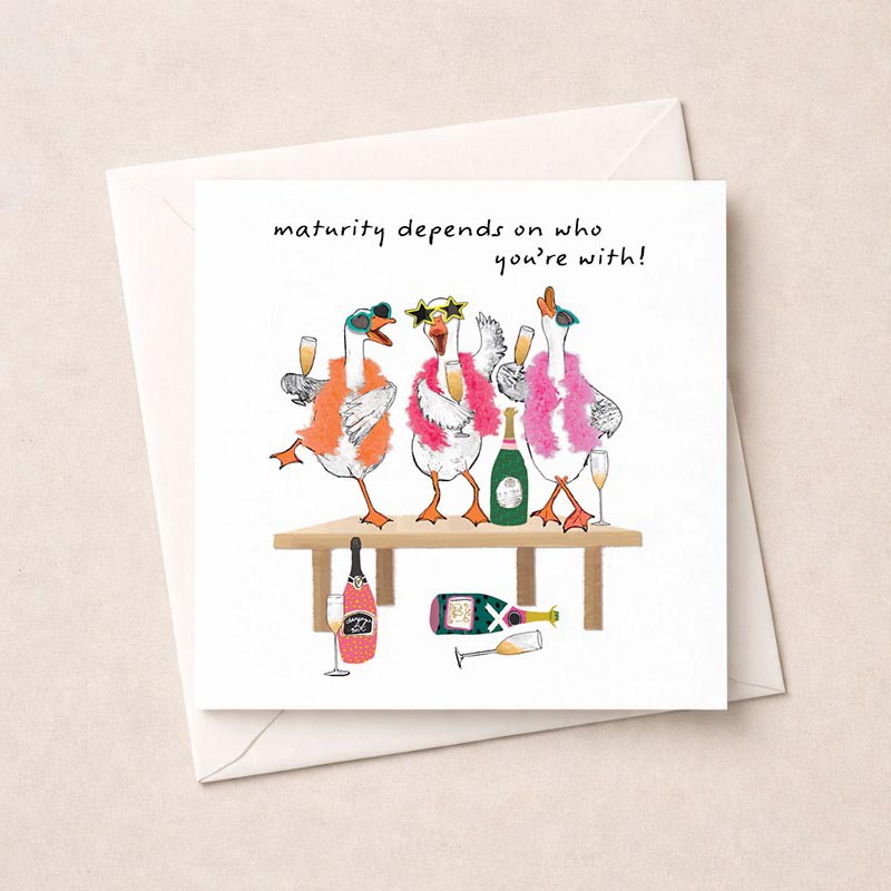 Cheerful greetings card with birds around a table, perfect for celebrations.