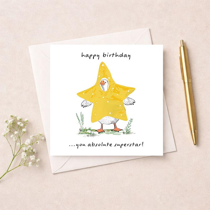 Cheerful duck in yellow star costume birthday greetings card. Perfect for spreading joy!