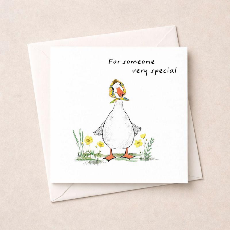 Cheerful duck holding flower on greetings card. Perfect for spreading joy and love. Ideal for sending warm wishes to someone special.