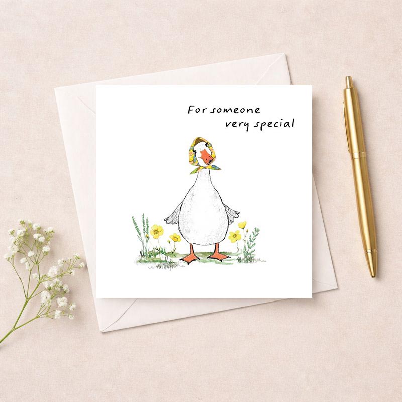 Cheerful duck holding flower on greetings card. Perfect for spreading joy and love. Ideal for sending warm wishes to someone special.