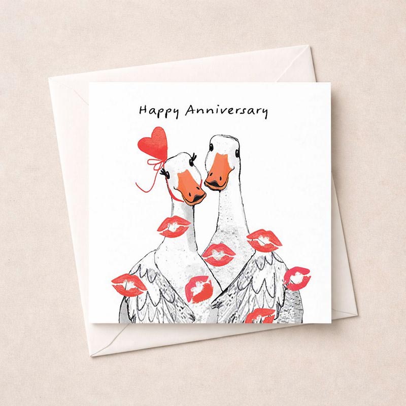 Two ducks with painted lips on their noses on a cute greetings card. Perfect for anniversaries and anyone who loves whimsy and charm.