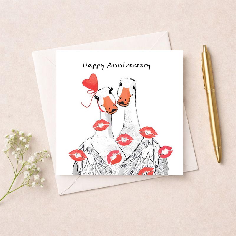 Two ducks with painted lips on their noses on a cute greetings card. Perfect for anniversaries and anyone who loves whimsy and charm.