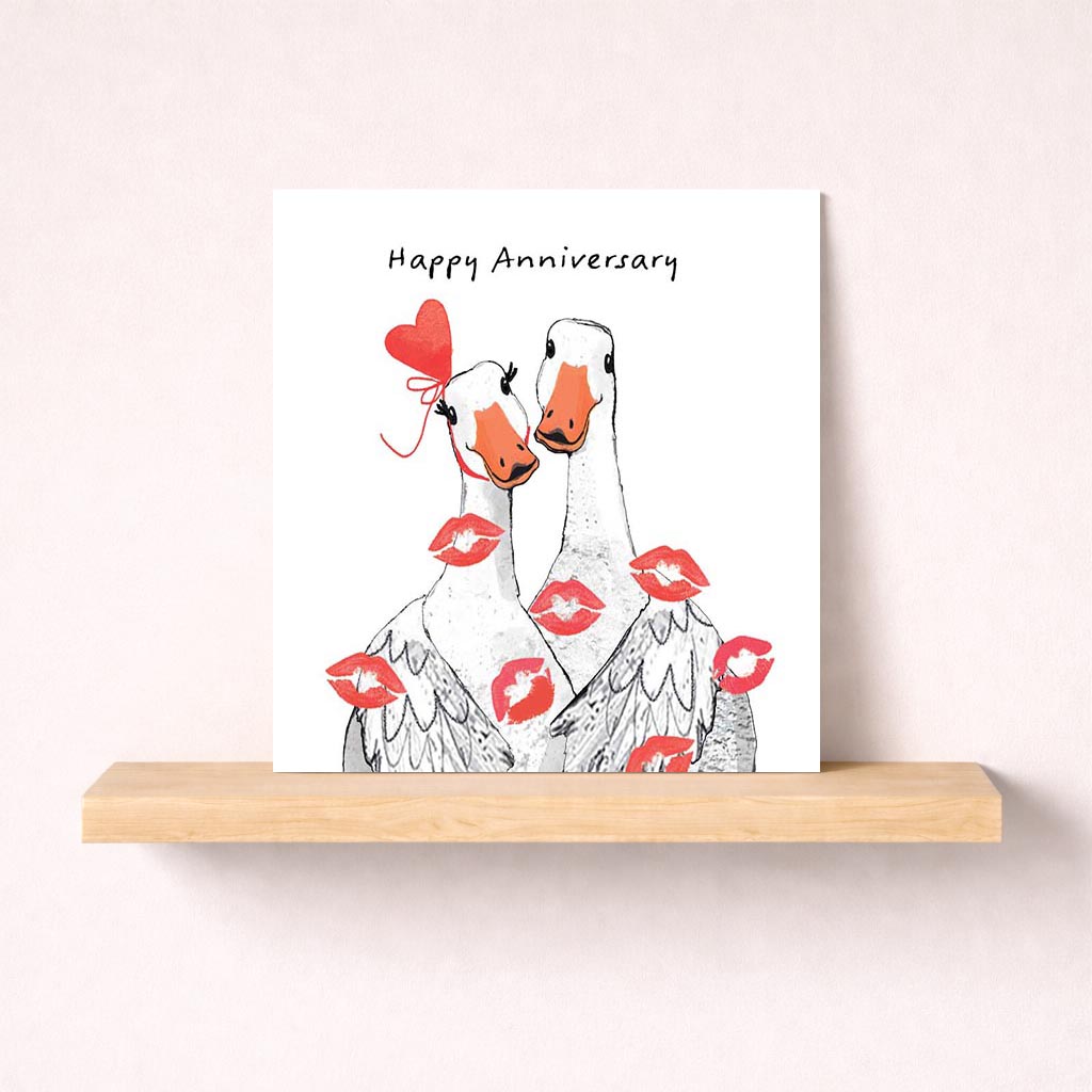 Two ducks with painted lips on their noses on a cute greetings card. Perfect for anniversaries and anyone who loves whimsy and charm.