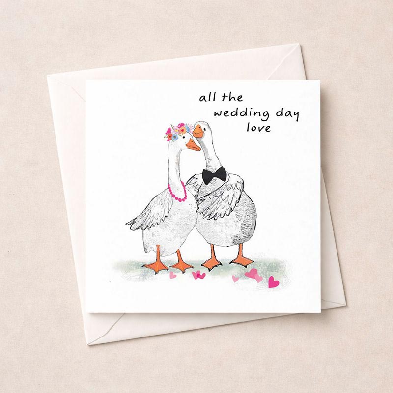 Sweet ducks in love on a greetings card - perfect for weddings, anniversaries, or spreading joy. Ideal for animal and nature lovers.