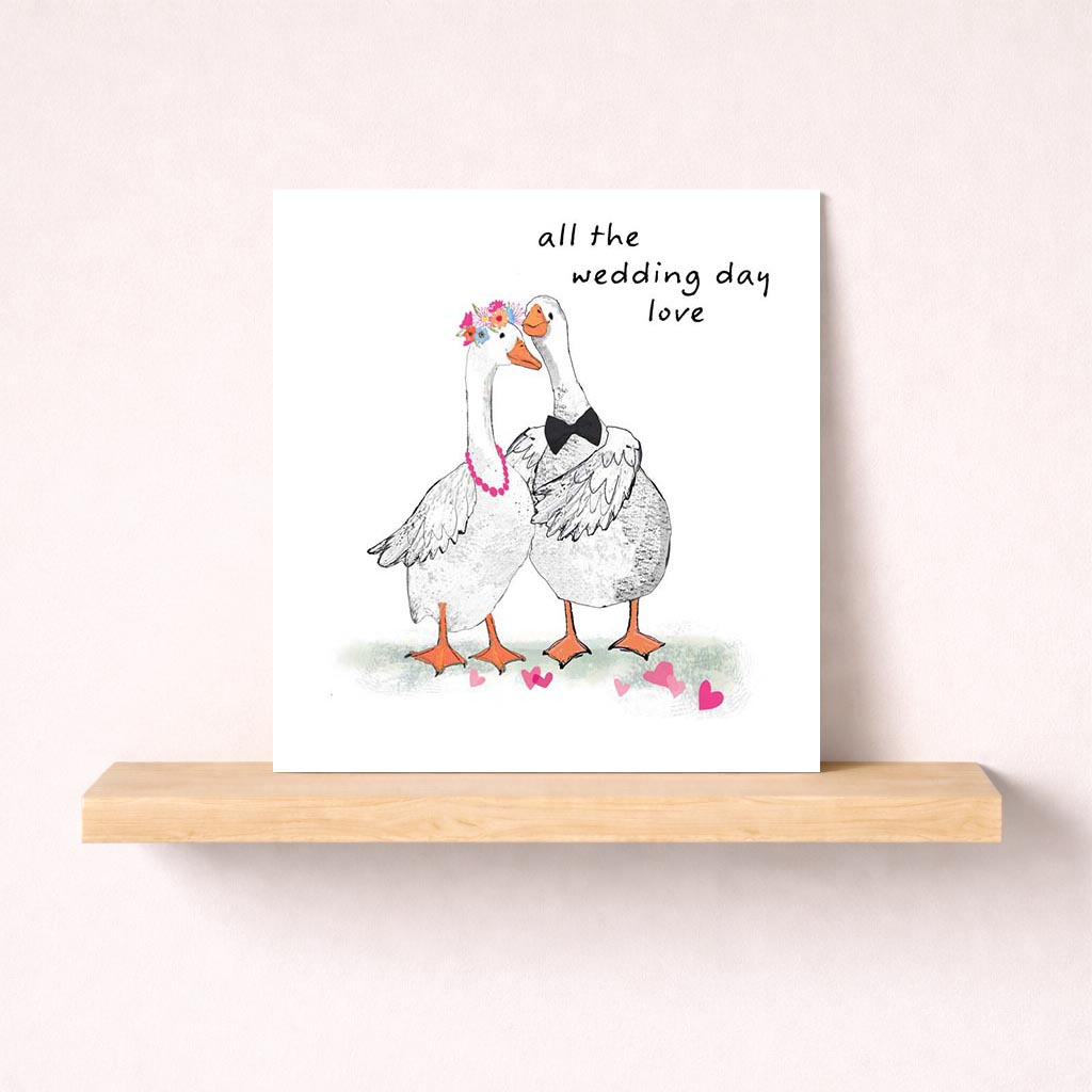 Sweet ducks in love on a greetings card - perfect for weddings, anniversaries, or spreading joy. Ideal for animal and nature lovers.