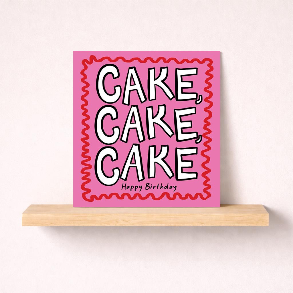 Pink birthday card with cake design and "CAKE, CAKE, CAKE Happy Birthday" message, perfect for loved ones.