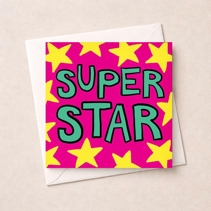 Bright pink greetings card with "SUPER STAR" message surrounded by yellow stars, perfect for celebrating someone special.