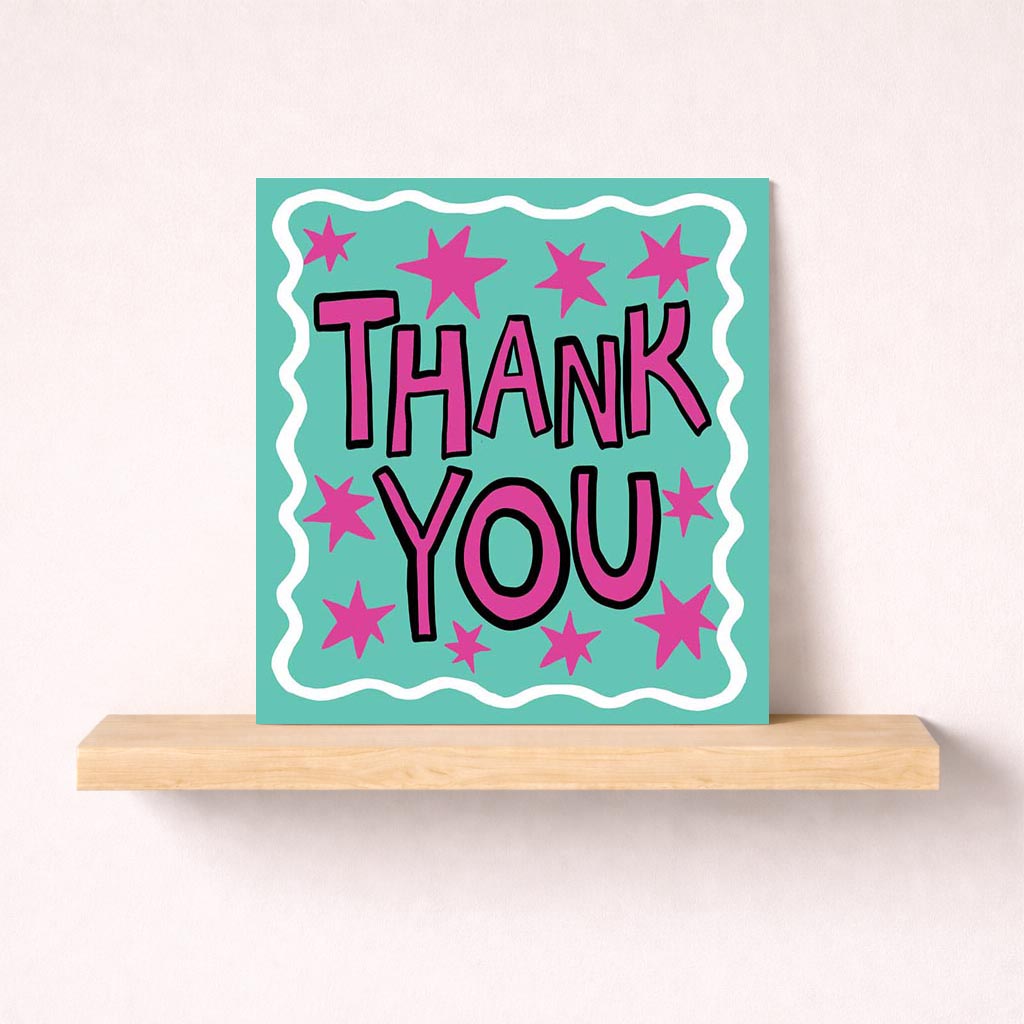 Bright pink starry greetings card with "THANK YOU" message on black background, perfect for showing appreciation to loved ones.