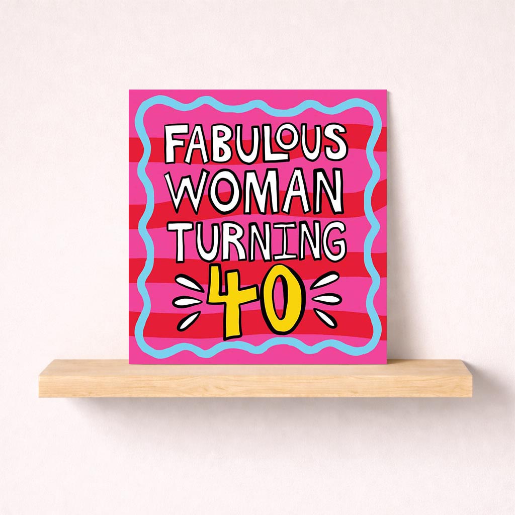 Vibrant pink card for a fabulous woman turning 40, with bold message "FABULOUS WOMAN TURNING". Perfect for celebrating her special day.