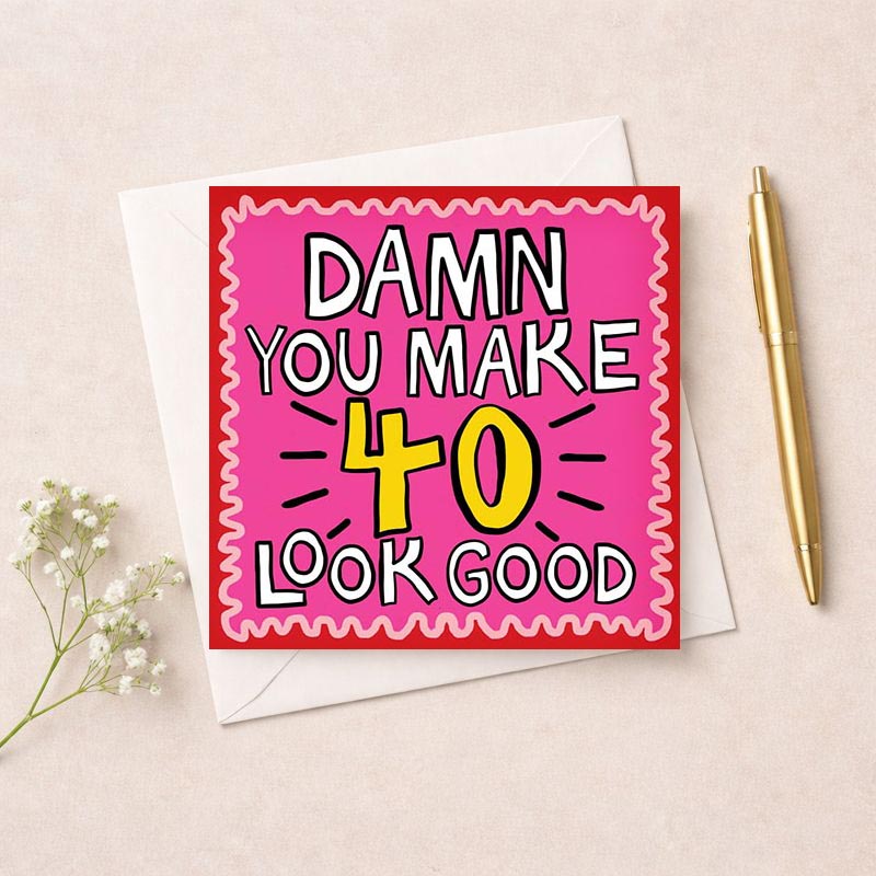 Bright pink card with bold yellow and black text saying "Damn you make 40 look good." Perfect for celebrating turning 40 with humor.