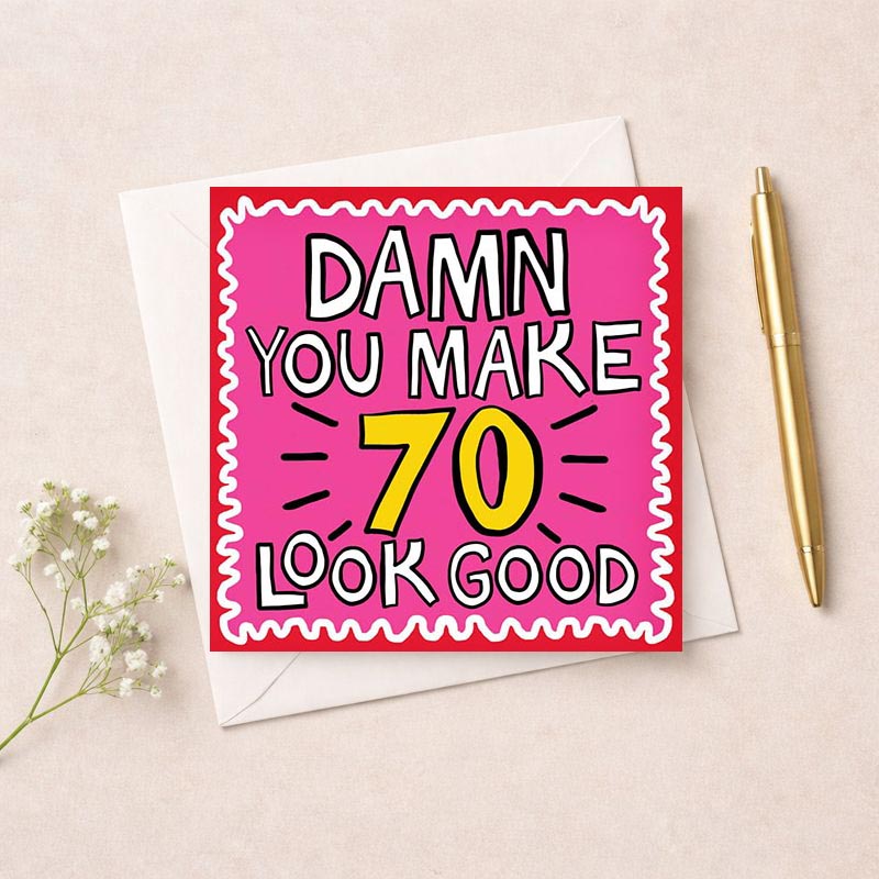 Bold pink card with empowering message "Damn you make 70 look good" in yellow and black. Perfect for celebrating a fabulous 70th birthday.