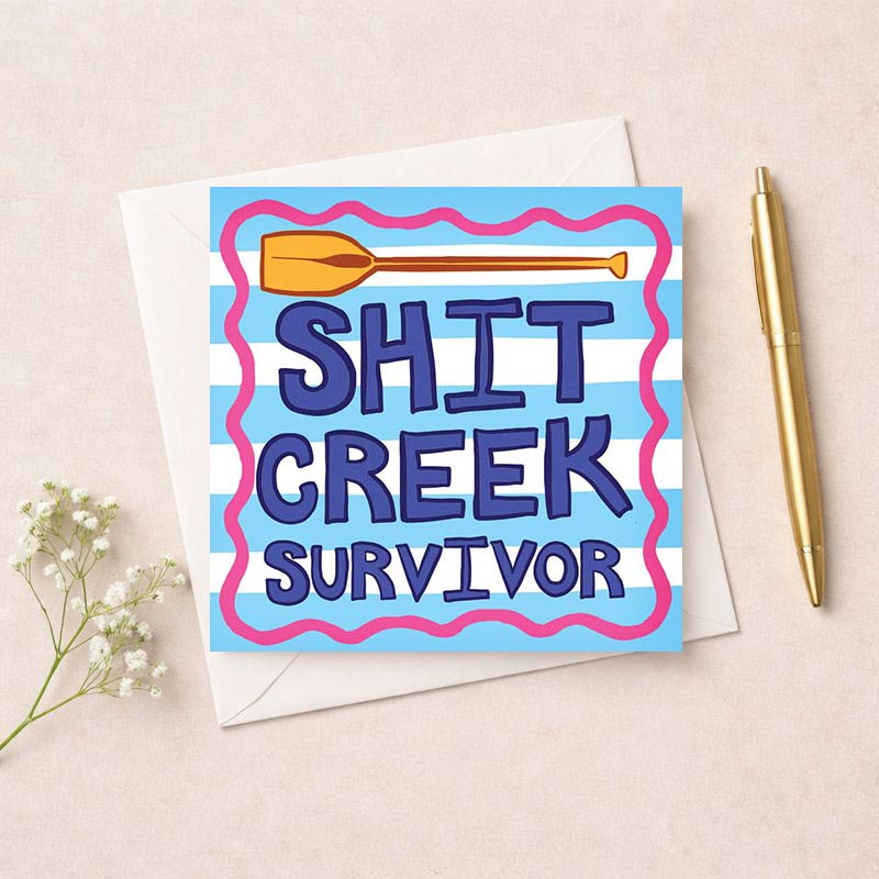 A blue and white striped greetings card with a paddle and "Shift Creek Survivor". Perfect for celebrating resilience and strength.