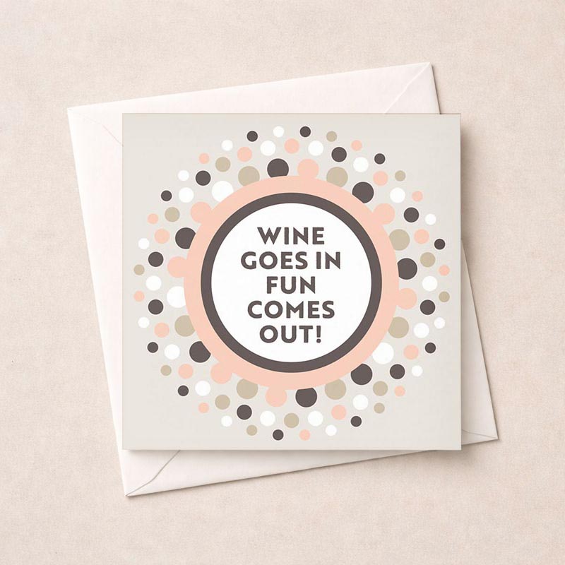 Colorful card with message: "WINE GOES IN FUN COMES OUT!" Perfect for wine lovers and spreading joy. Ideal for celebrations or sharing a laugh.