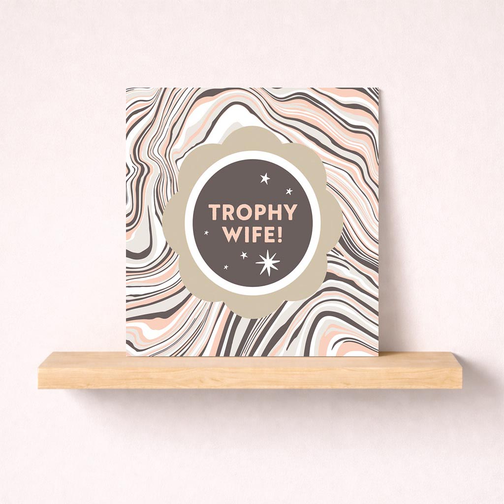 Stylish "TROPHY WIFE!" card with marbled background, perfect for special women in your life.