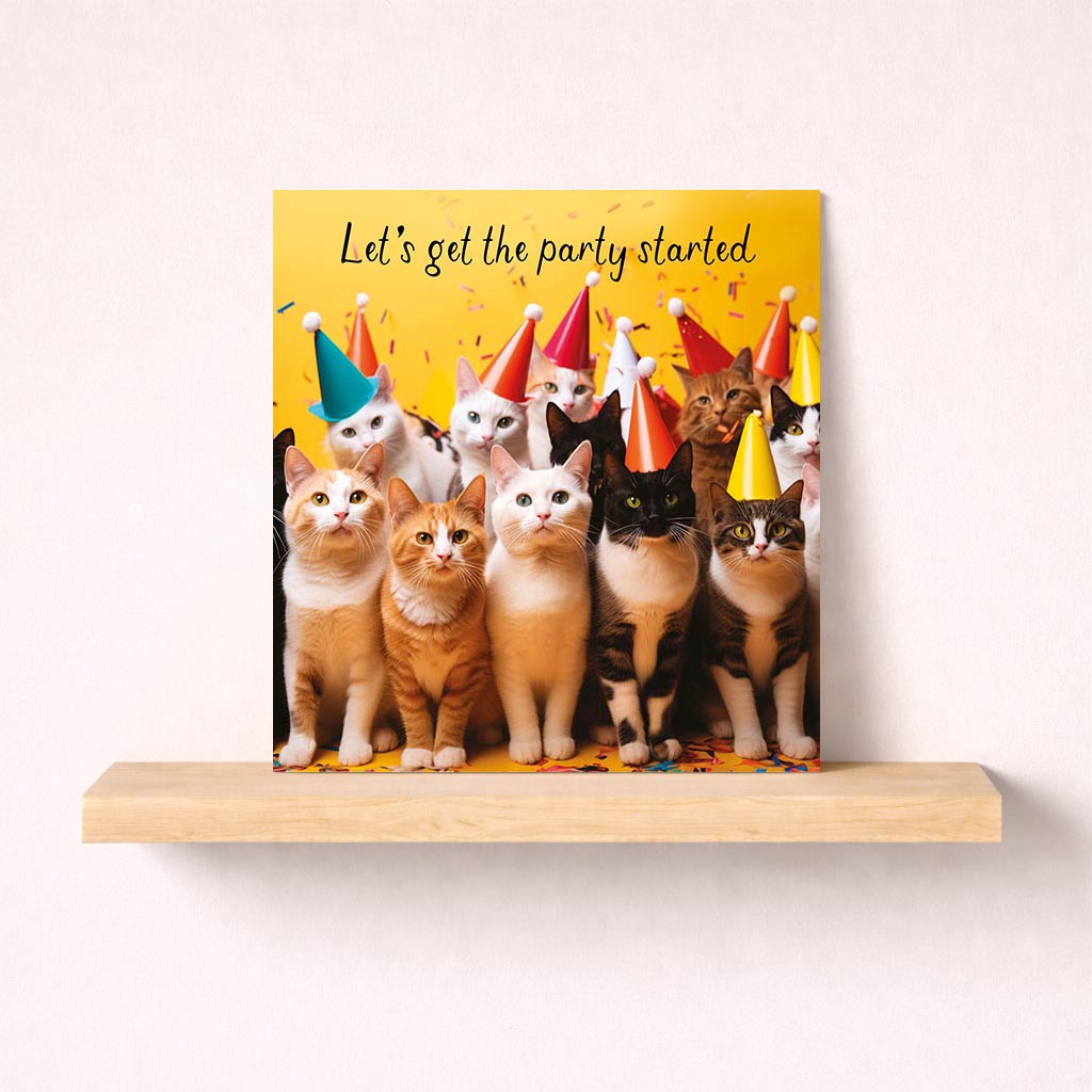 Charming greetings card with cats in party hats, perfect for cat lovers of all ages.