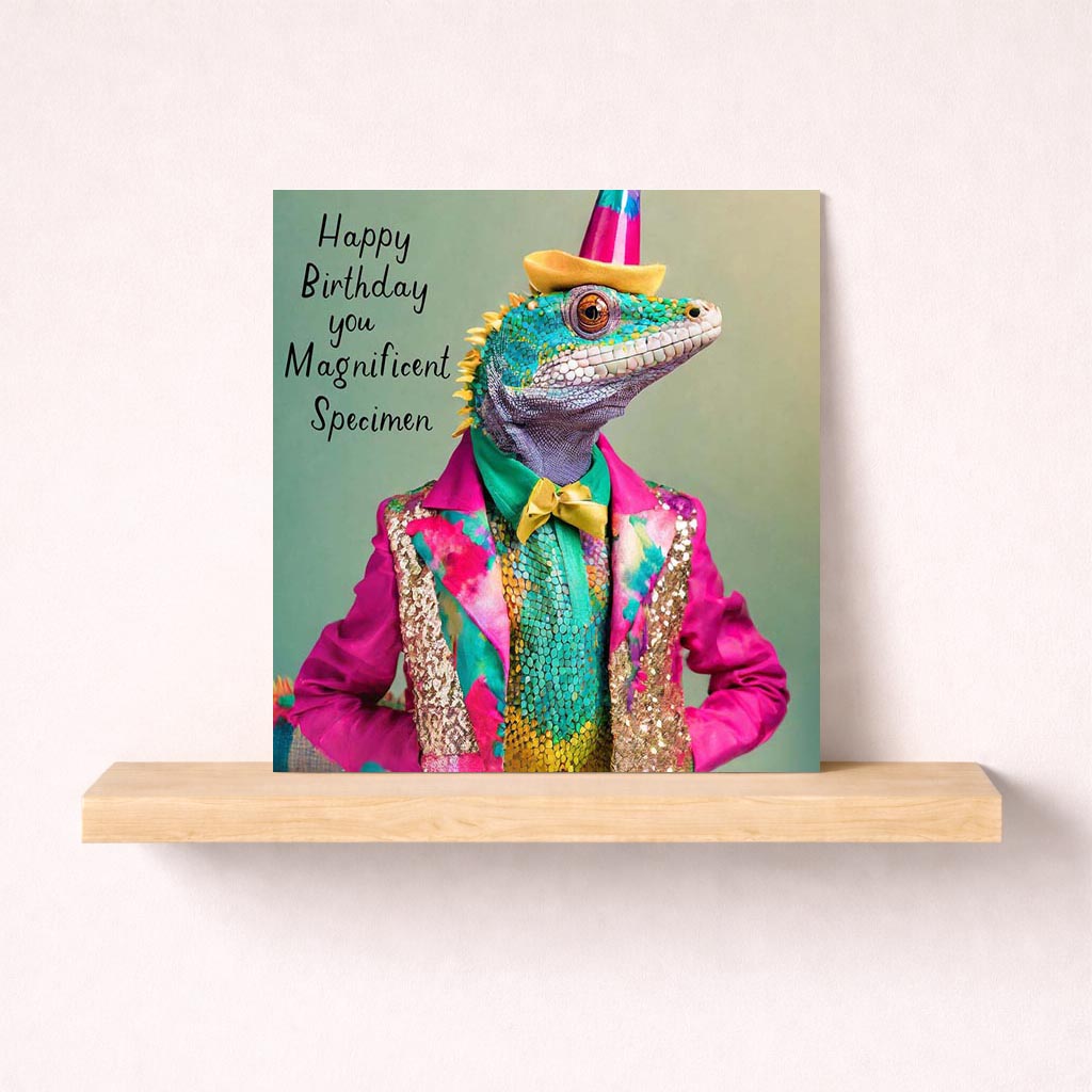 Vibrant greetings card with a lizard in a snazzy suit and hat, perfect for adding a splash of colour and laughter to someone's day.