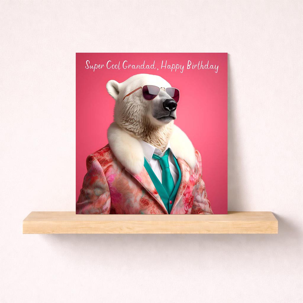 Stylish polar bear in suit and shades on pink background. Card reads: "Super Cool Grandad, Happy Birthday". Perfect for fun-loving grandads!