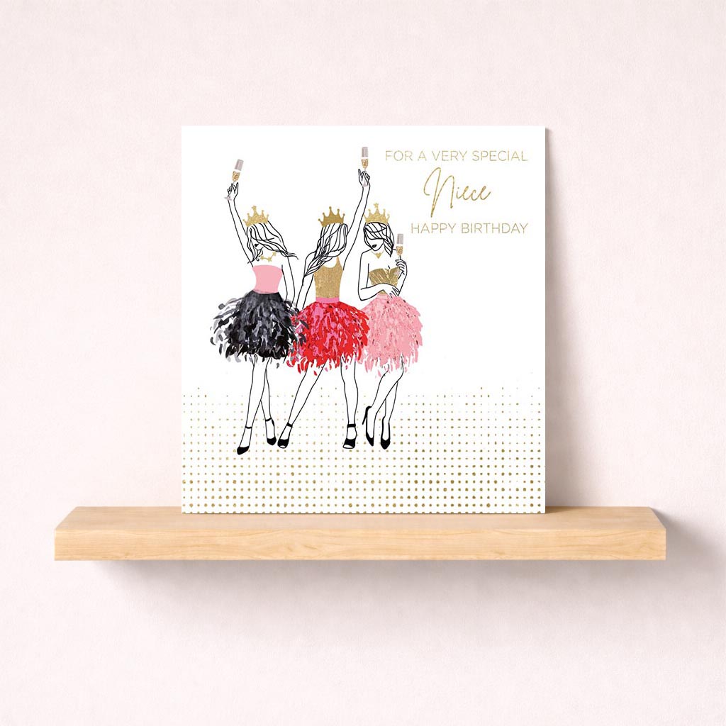 Three elegant ladies in beautiful dresses, each holding a champagne glass, exuding sophistication and joy. Perfect for birthdays or congratulations.