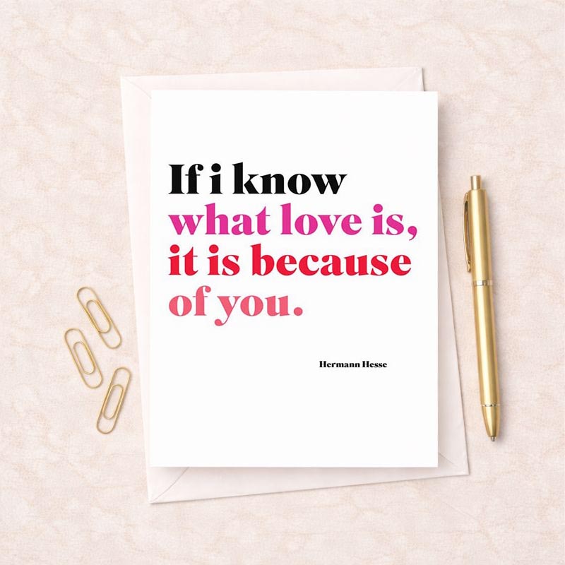 White greetings card with pink and red text that says, "If I know what love is, it is because of you.