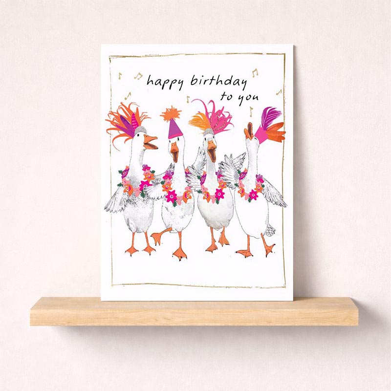 Adorable greetings card with three ducks in hats and flowers, perfect for birthdays or saying hello to a friend.