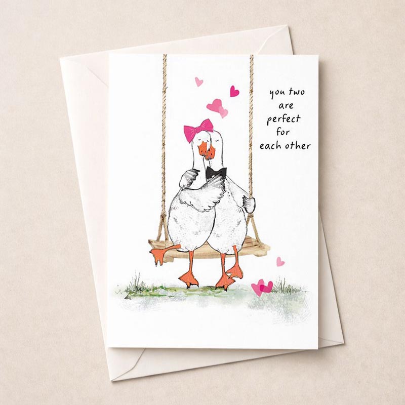 Two cute ducks on swing surrounded by hearts, perfect for expressing love and friendship. Ideal for birthdays, anniversaries, or just to say hello.