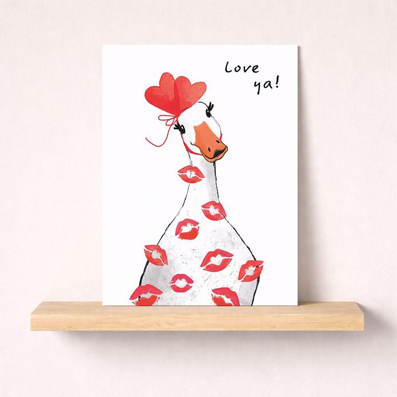 Cute duck with lipstick holding heart balloon. Playful, sweet greetings card to brighten someone's day. Spread cheer today!