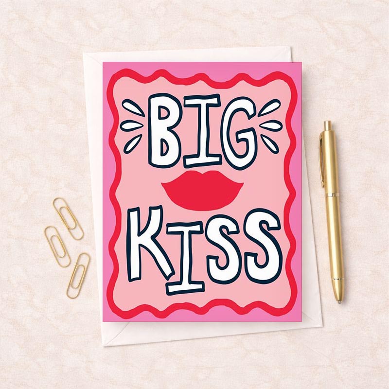 Pink greetings card with bold red lips, perfect for sending a big kiss to someone special.