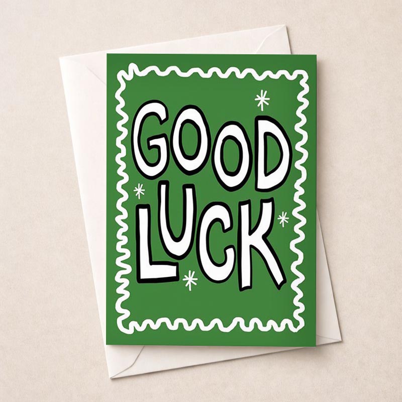 Bright green card with white 'good luck' message. Simple, stylish design for any occasion. Spread positivity and cheer!